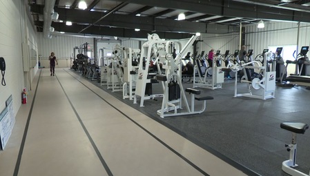 walking track and various fitness and weight machines