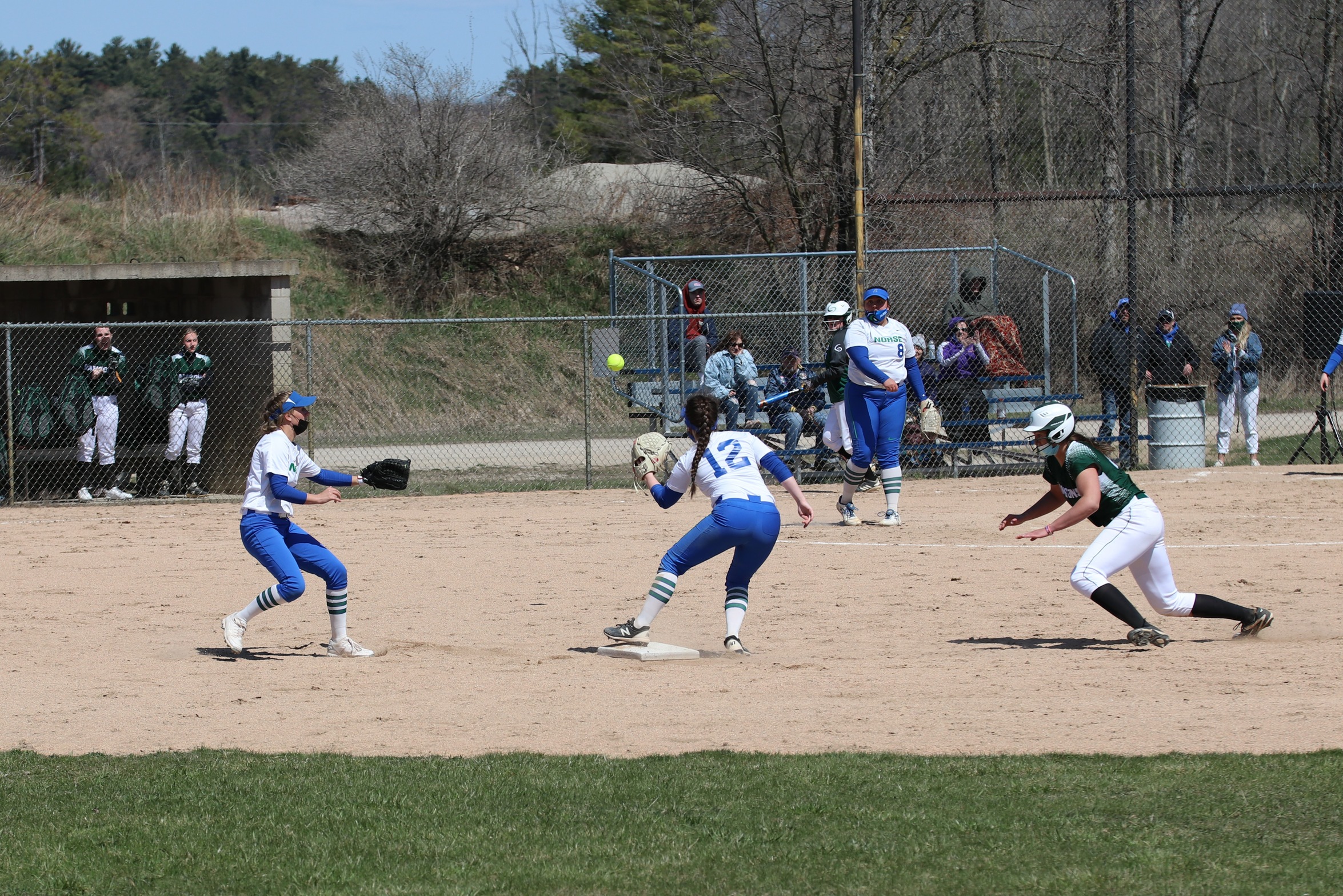 Karlie Patron throws to Sarah Wynn at second in an attempt to double off a runner