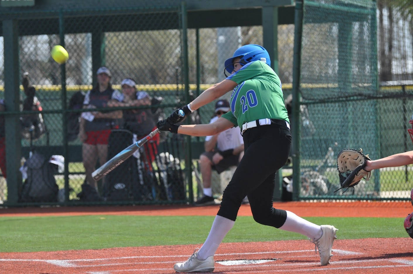 Ellie Miller drives a ball at the plate