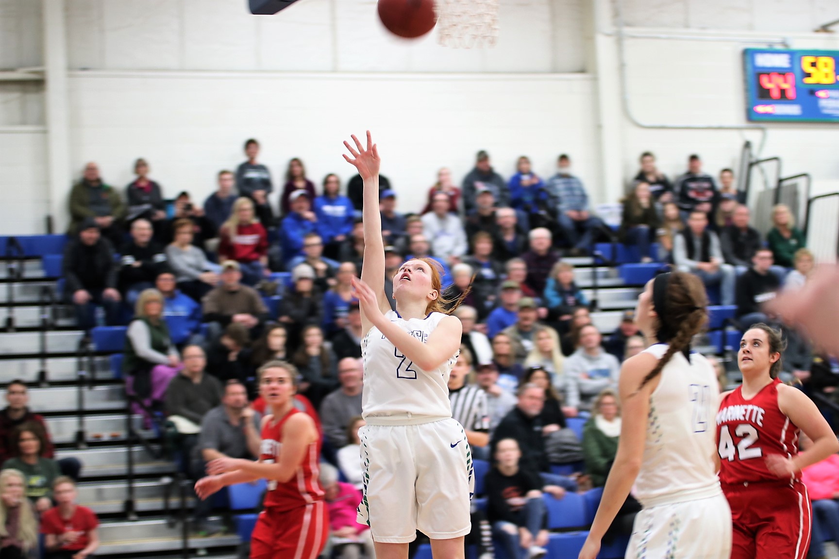 JuliAnn Wickman watches as the shot she just released goes toward the rim