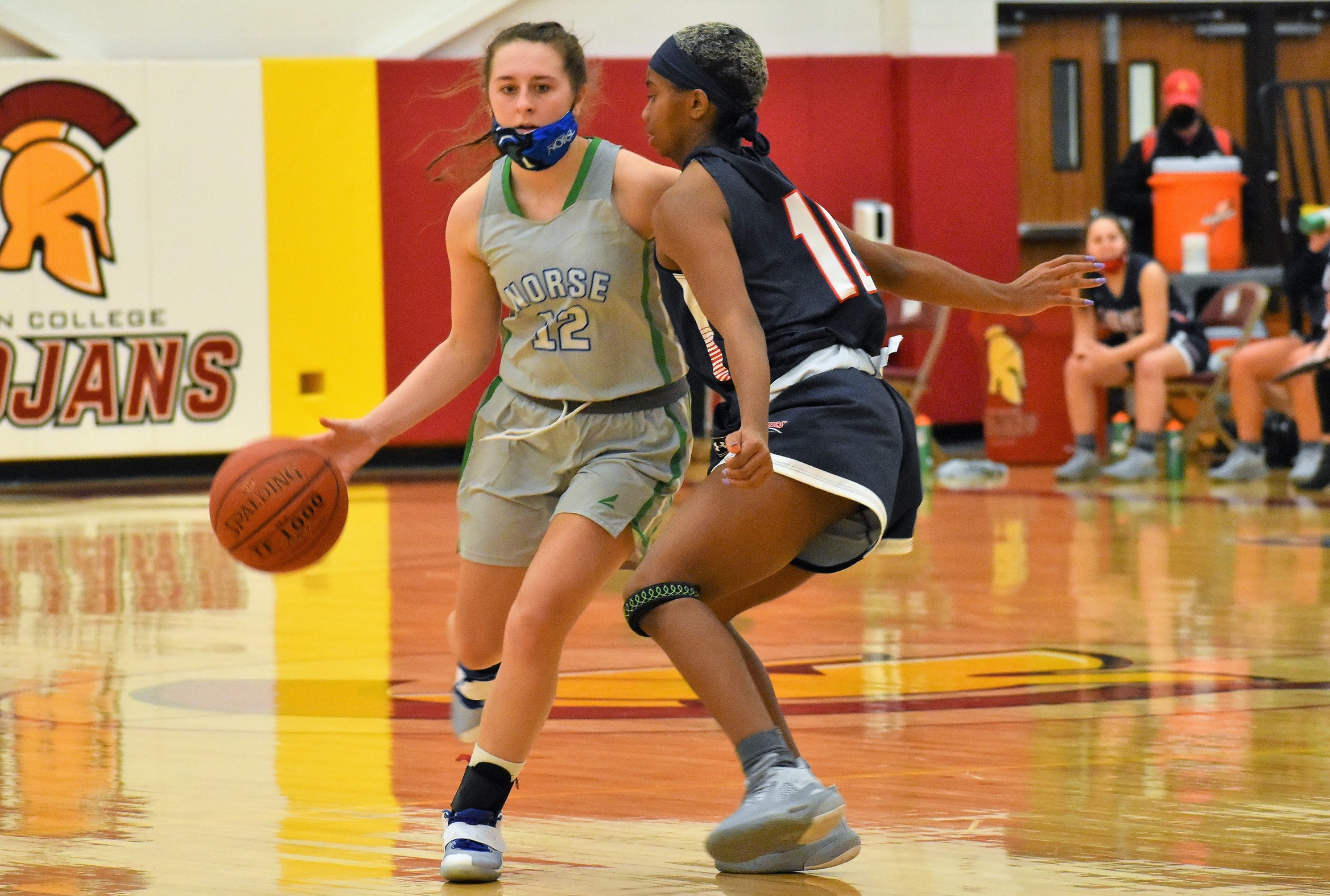 Cierra Molina driving to her right, a Kankakee defender tries to cut her off.