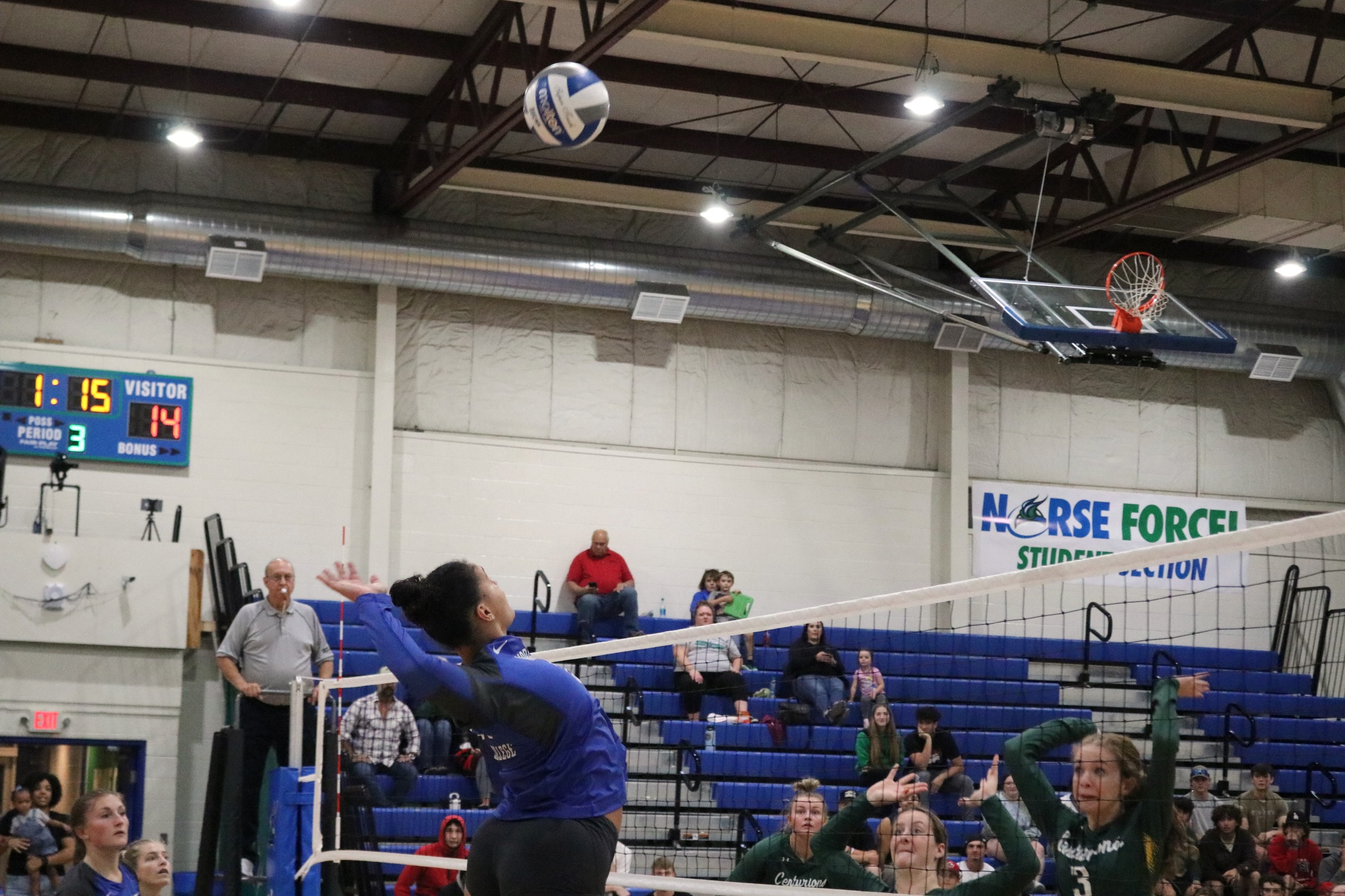 Tianna Taylor leaping up for a kill