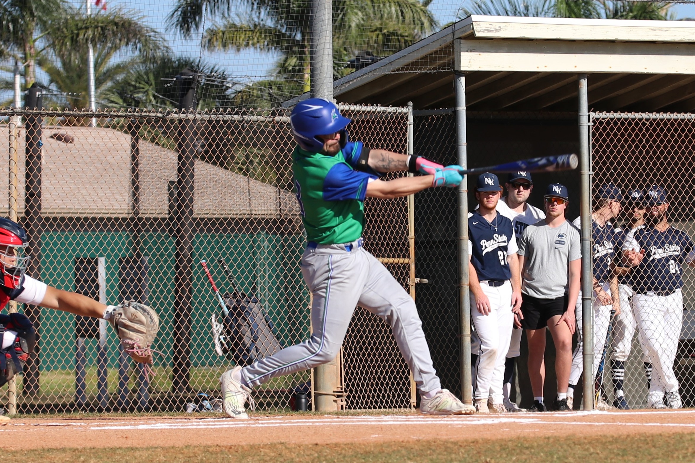 Michael Rey mid swing