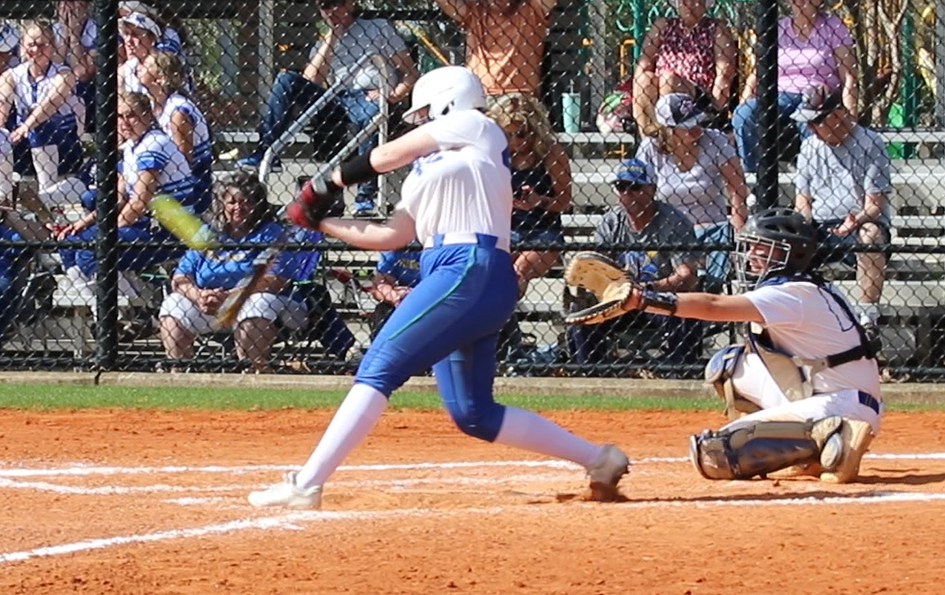 Sierra Jones making contact with a ball at the plate